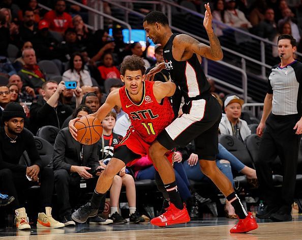 Trae Young and Trevor Ariza